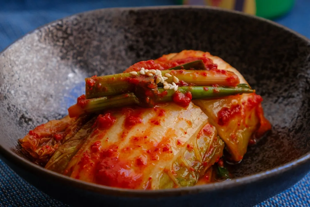 Fermented kimchi with live probiotic cultures served in a bowl