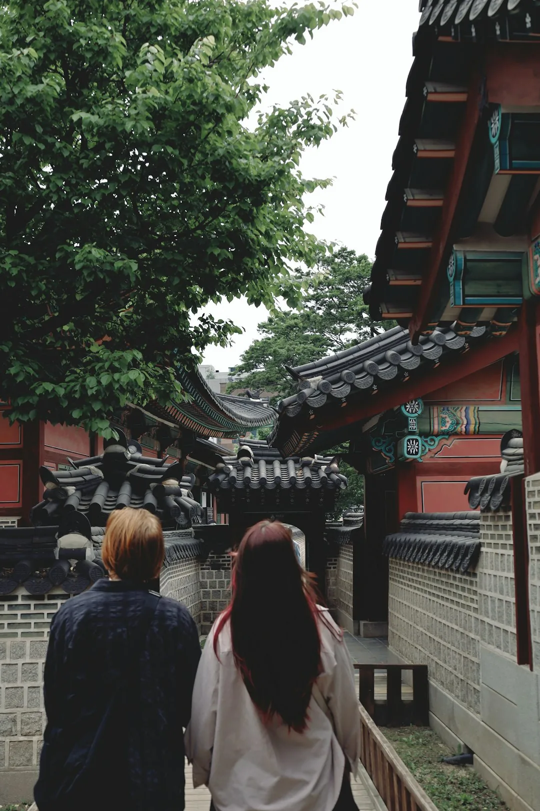 Couple exploring a traditional Korean building while on a date