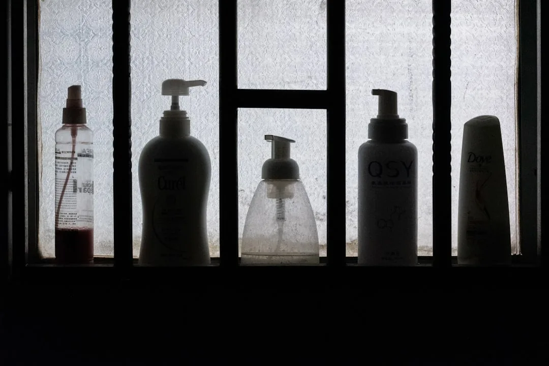 Korean haircare bottles from brands like Mise en Scene and Ryo lined up on a shelf